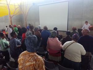 Photo of man addressing audience