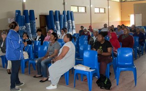 Photo of woman addressing meeting