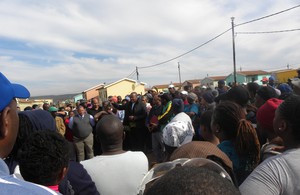 Photo of man addressing crowd