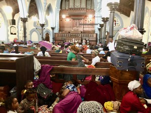 Photo of people in a church