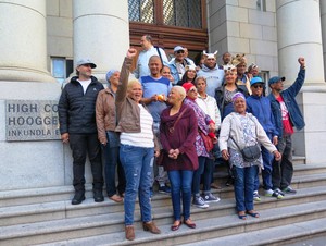 Photo of a group of people on the court steps