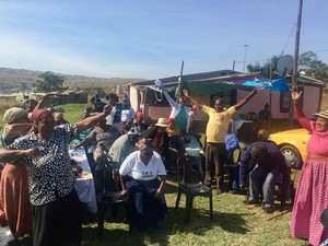 Photo of elderly people at a table