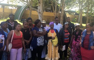 Photo of people waiting in a circle