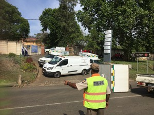 Photo of gates blocked with vans