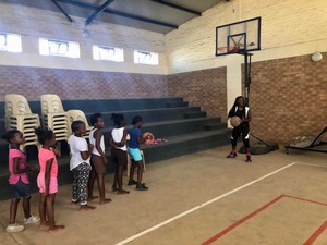 Photo of youngster playing basketball