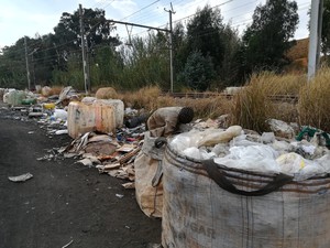 Photo of waste picker sorting rubbish